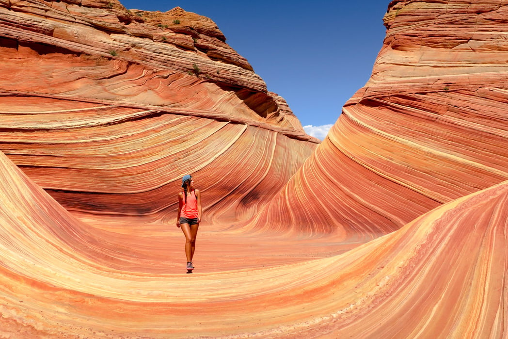 Woman Standing on Sandstone Landscape