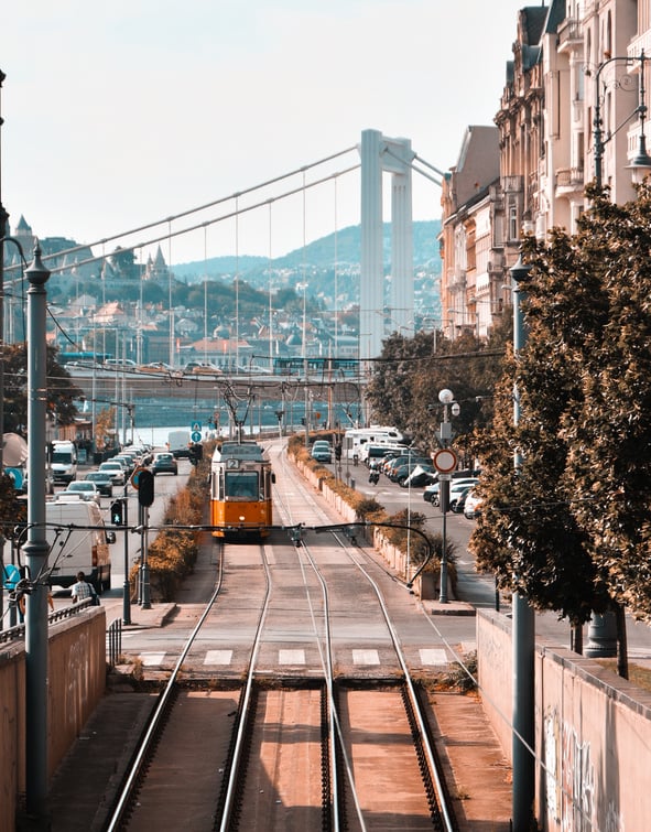 Photography of Tram Traveling on Road